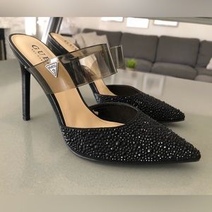 Guess black slip-on pointed toe heels.